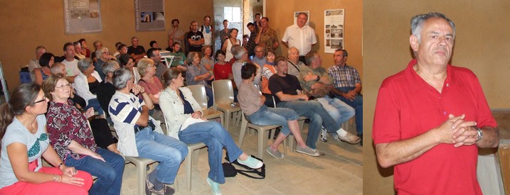 Eglise de LaVinouze: un public attentif à la présentation faite par Guy ROUMAGNAC, président de HIAUDE